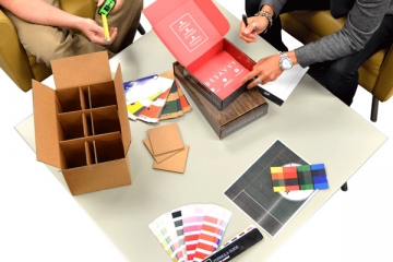 Consult with customers about printing and packaging design